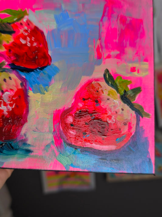 Close-up detail of the strawberry oil painting showing brush texture and paint surface
