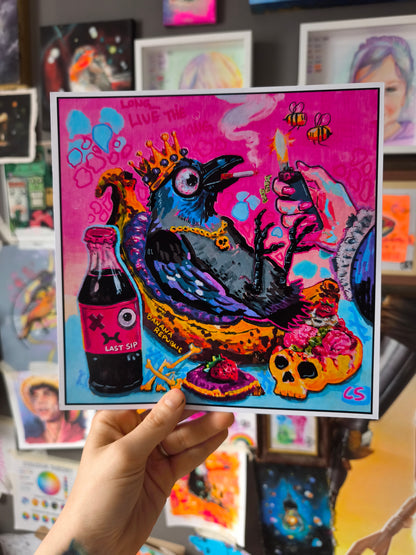 Colorful surreal crow artwork featuring a bird on a banana throne surrounded by bones, candy colors and playful creepy cute details. A vibrant hand signed Candy Decay art print mixing animal fantasy, humor and dark whimsical storytelling.