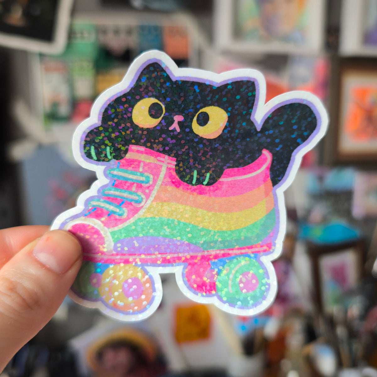 Black cat in rainbow roller skate, with glitter