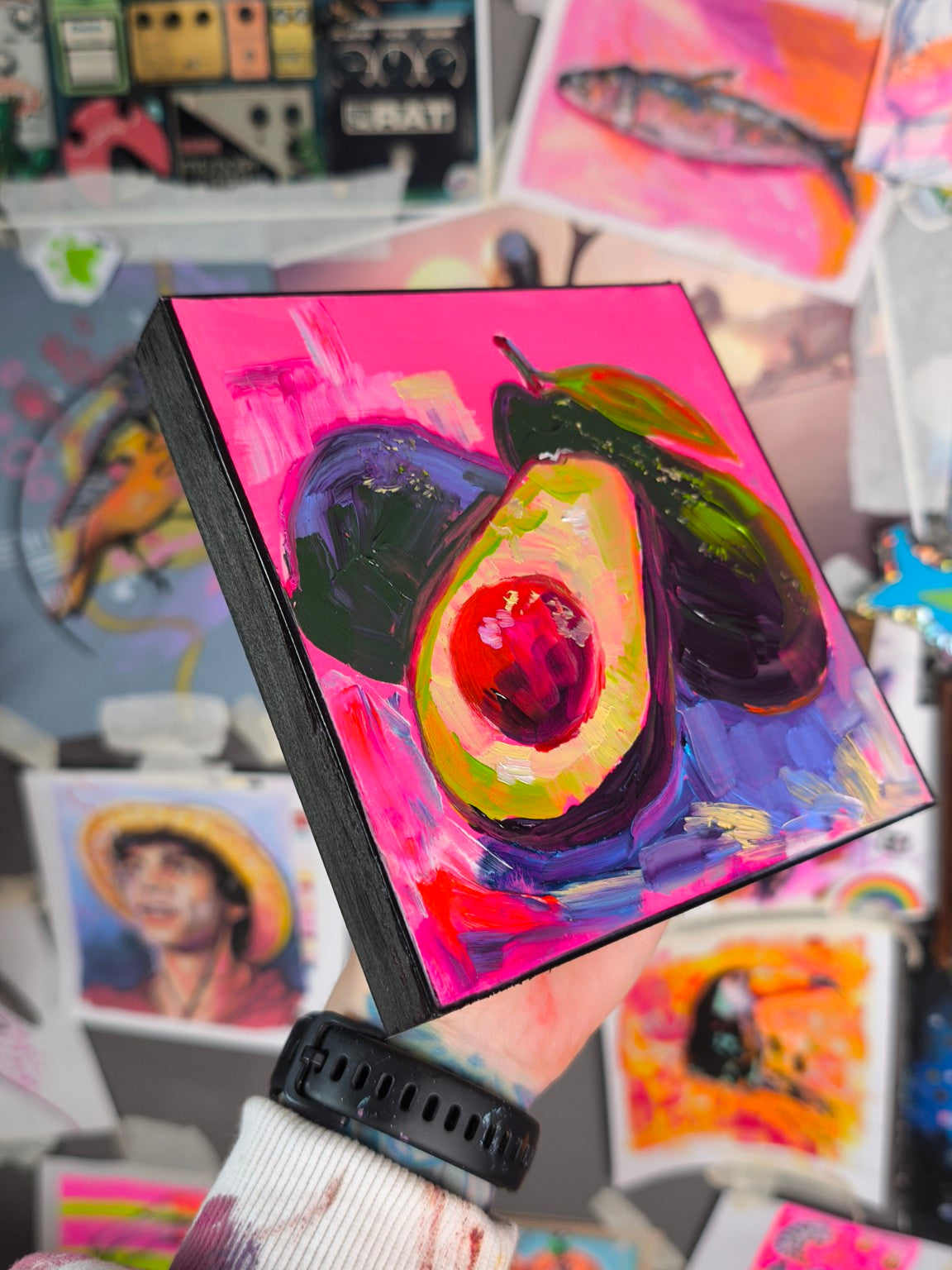Angled view of a small square avocado oil painting by Paintranger