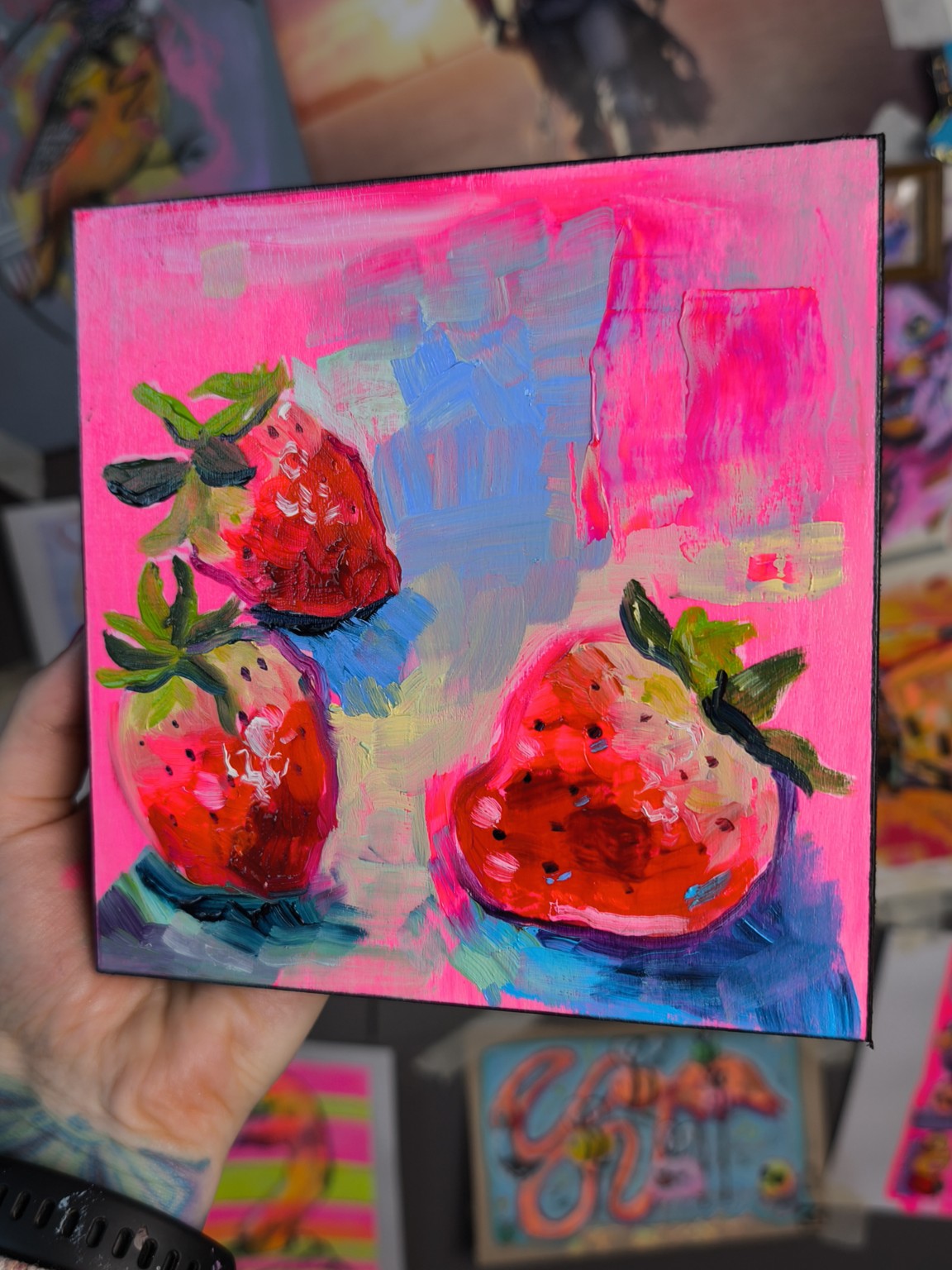Angled view of a small square strawberry oil painting by Paintranger