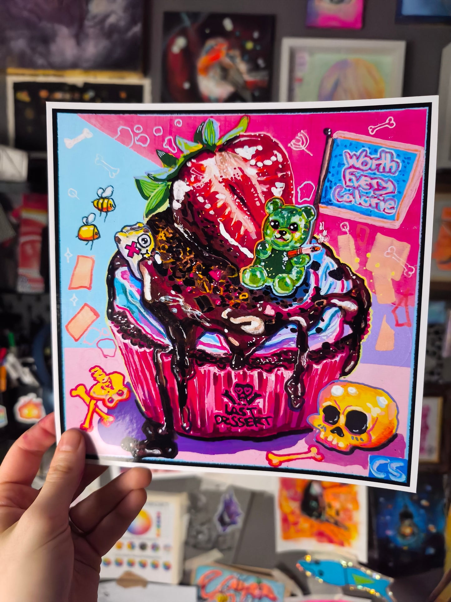 Cute creepy skull cupcake art print in Candy Decay style by Paintranger, colorful surreal dessert artwork with smoking gummy bear and dark cute details