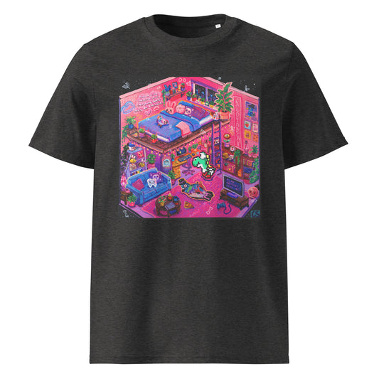 Colorful graphic T-shirt featuring the "Inside the Candy Decay Studio" artwork, showing a cozy pink loft bedroom and creative studio filled with plants, pigeons, retro gaming details, and playful pop surreal elements in vibrant neon colors.