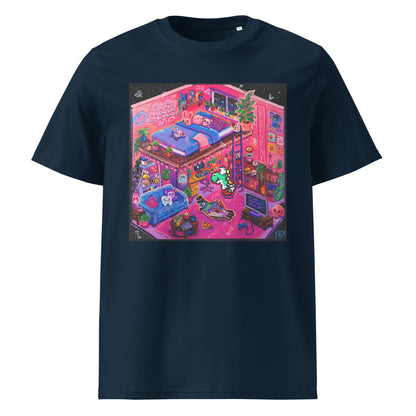 Colorful graphic T-shirt featuring the "Inside the Candy Decay Studio" artwork, showing a cozy pink loft bedroom and creative studio filled with plants, pigeons, retro gaming details, and playful pop surreal elements in vibrant neon colors.